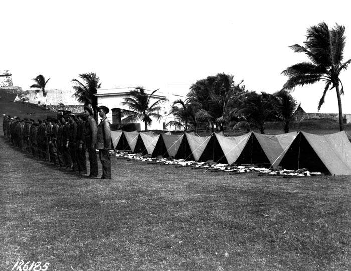 Inspection of pup tents and equipment of 51st C.A. at El Morro before leaving for maneuvers. San Juan, Puerto Rico. 1941.  SC 126185